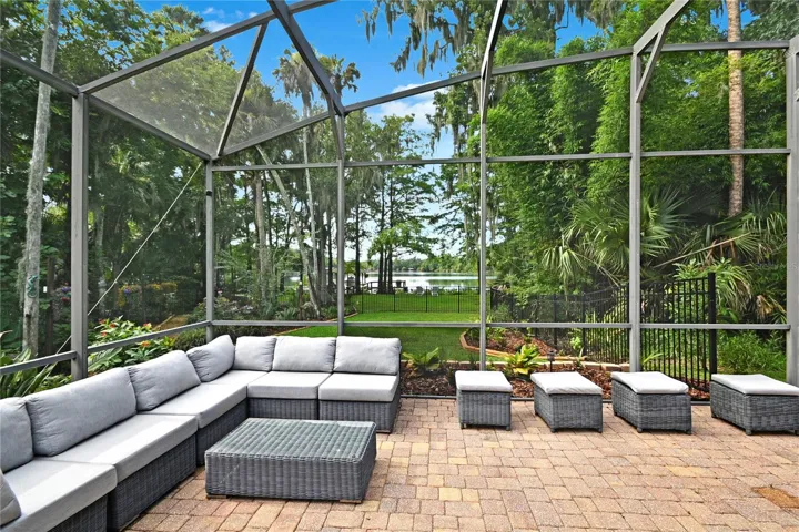 Pool deck with lake view.