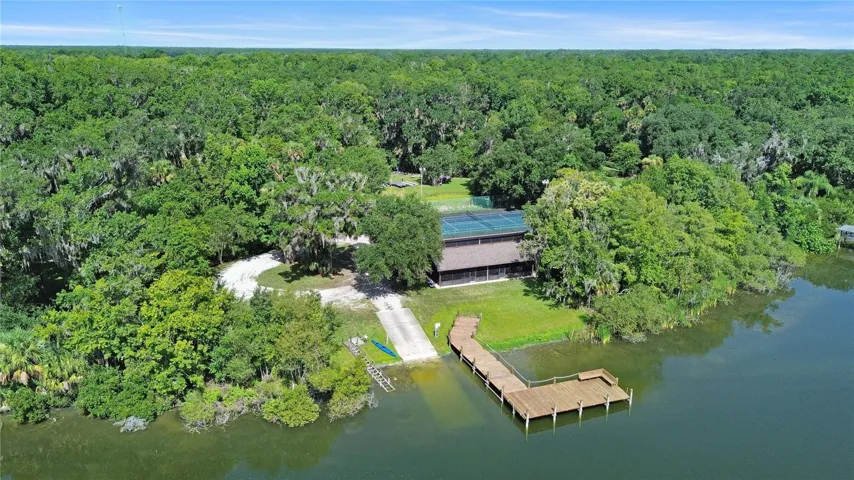 Community boat ramp, clubhouse, pickleball court and trailer storage lot.