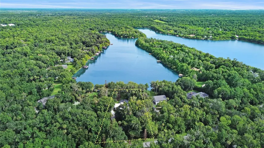 1.44 acres in a private gated community with lake frontage.