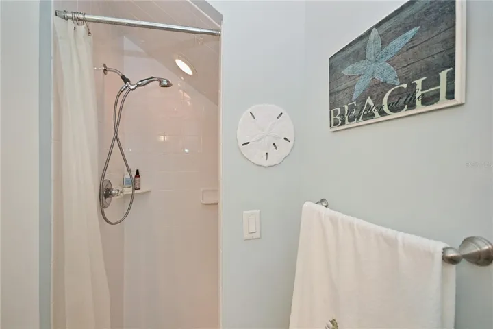 3rd bathroom shower has pet cleaning station.