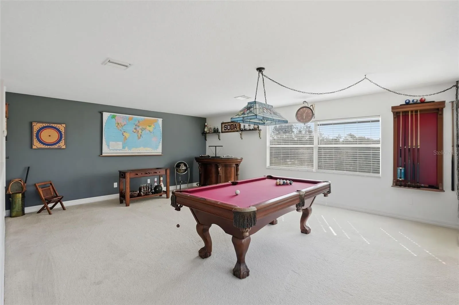 Pool Table may stay-light above it does not convey