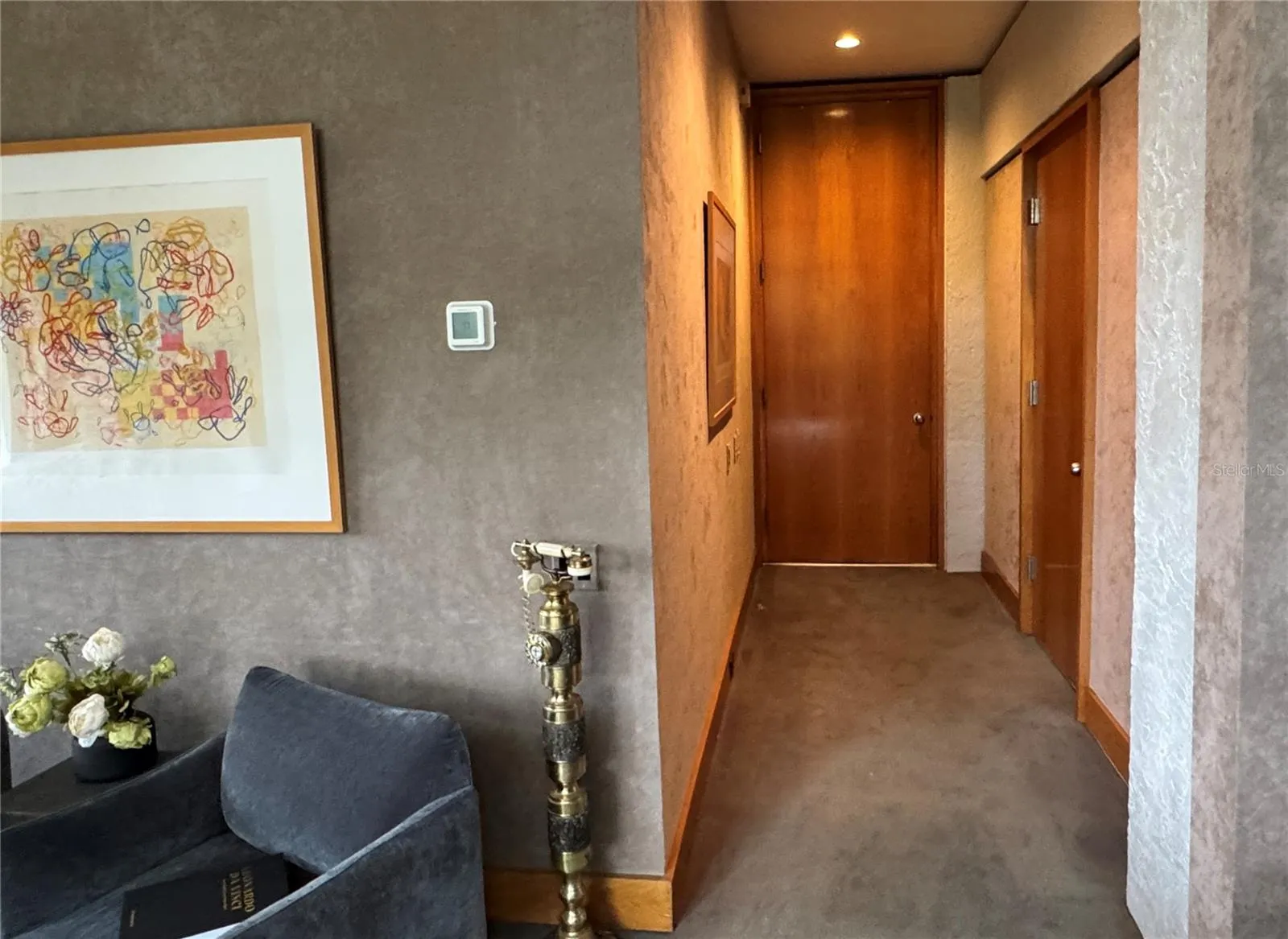 The hallway and door in the In-Law Suite