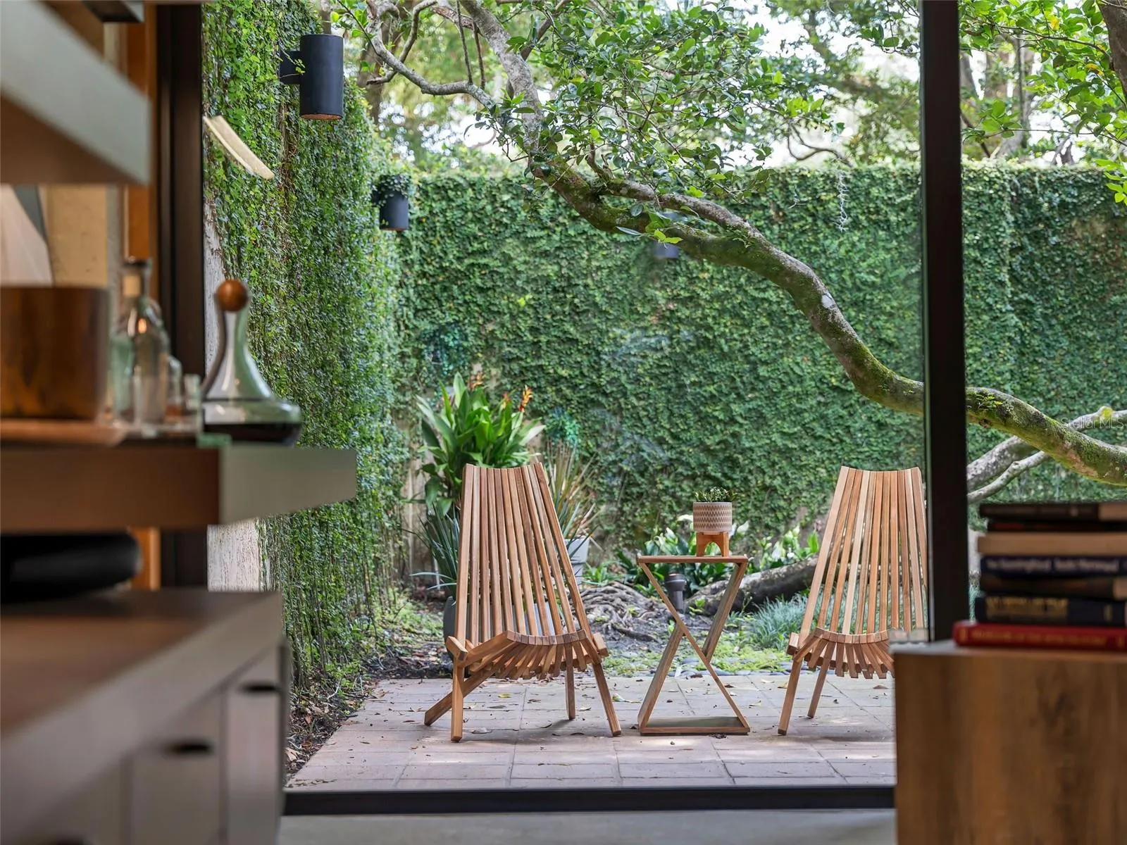 The 8' walled Private Owner's Garden off the Owner's Sitting Area