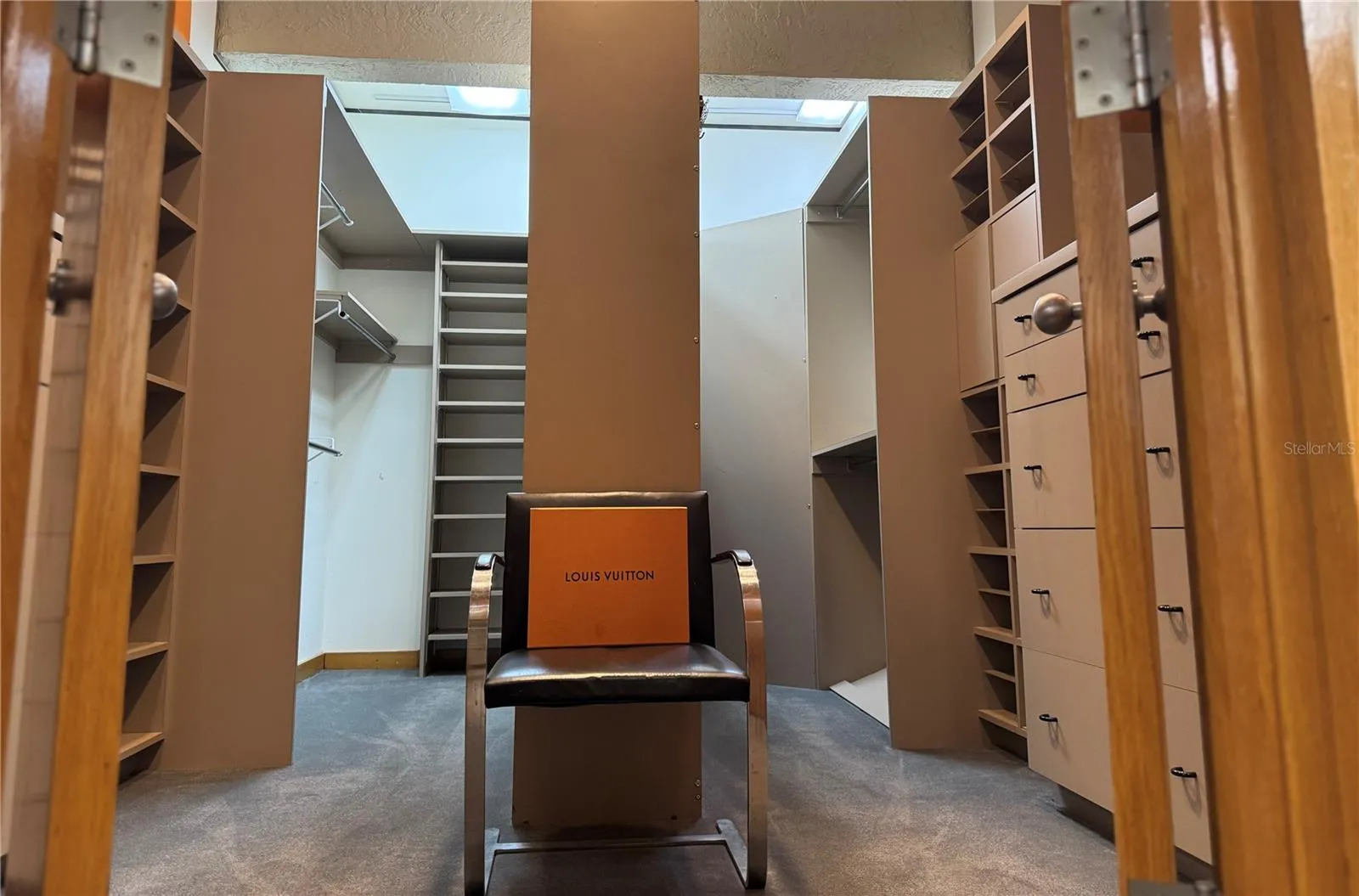 The Custom Built His and Her's Closet