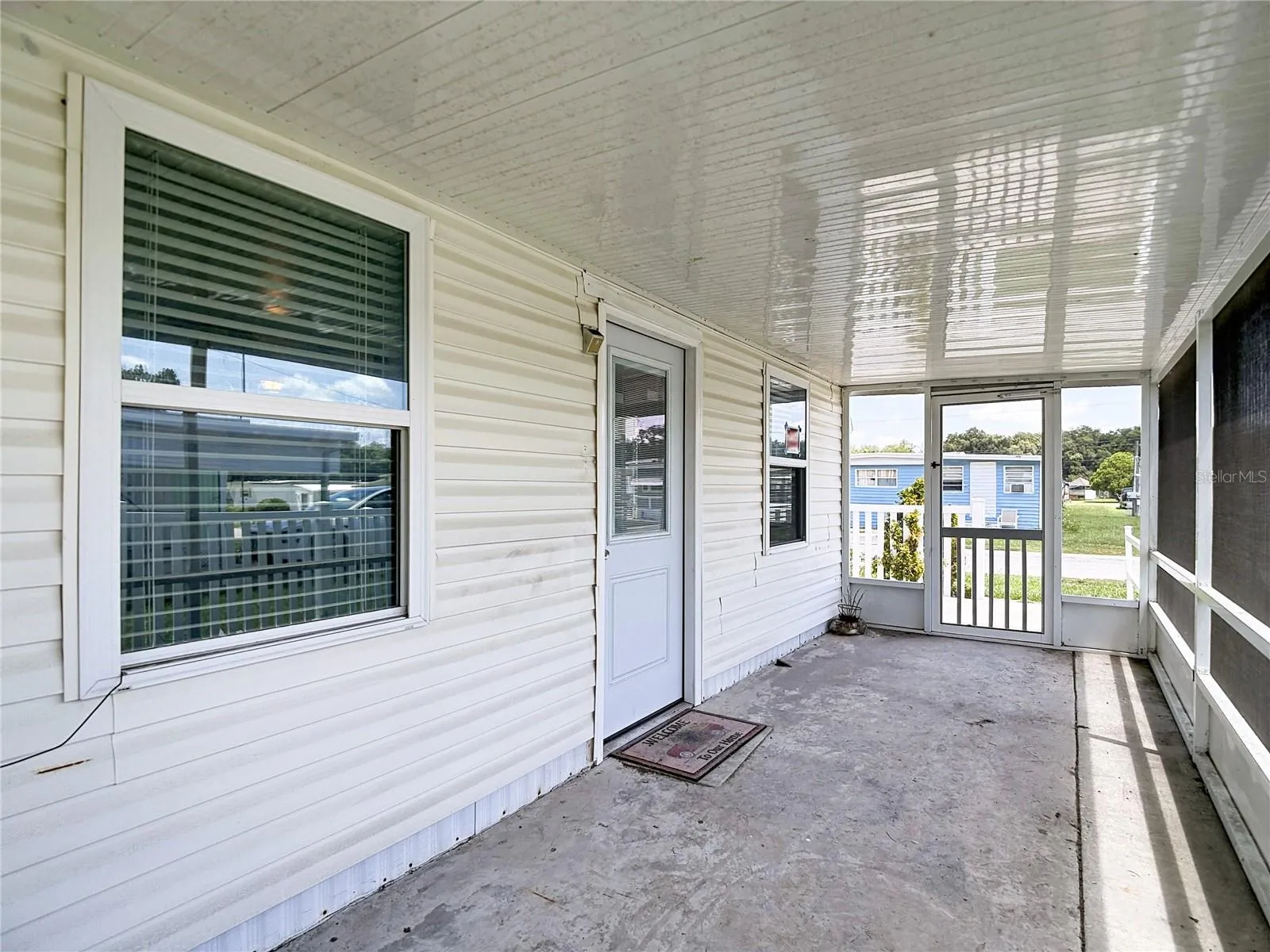 Front screened porch. One side has a lockable doggie door