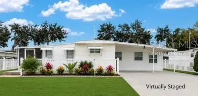 Virtually Staged- How changing the flowerbed can change the look of the home