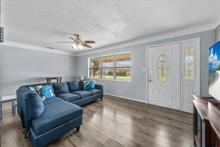 Natural light flows effortlessly into your front living space