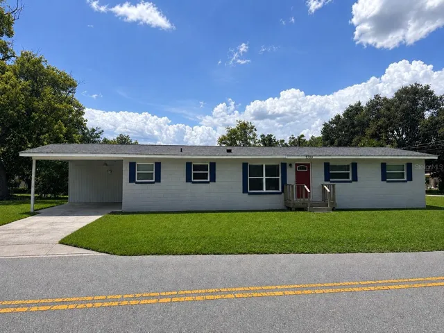 Front of home with carport