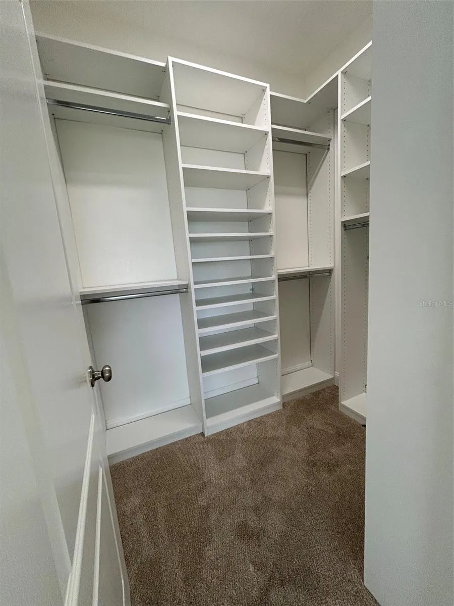 Downstairs Primary walk in custom closet