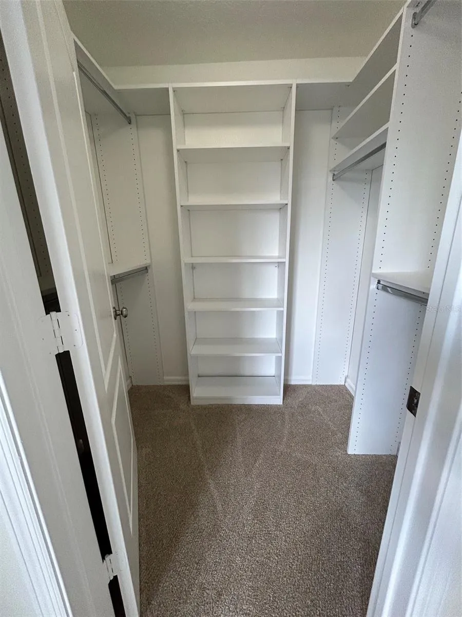 Upstairs custom walk in closet 2