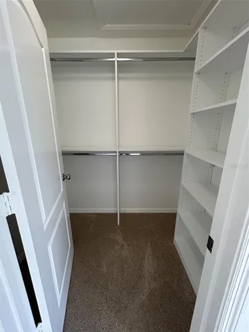 Upstairs custom walk in closet 1