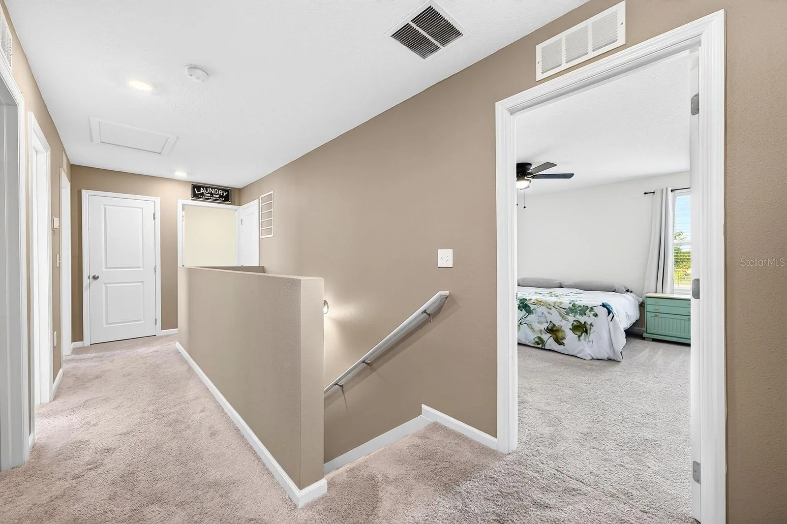 Upstairs, all three bedrooms provide a comfortable retreat with PLUSH CARPETING and generous closet space.