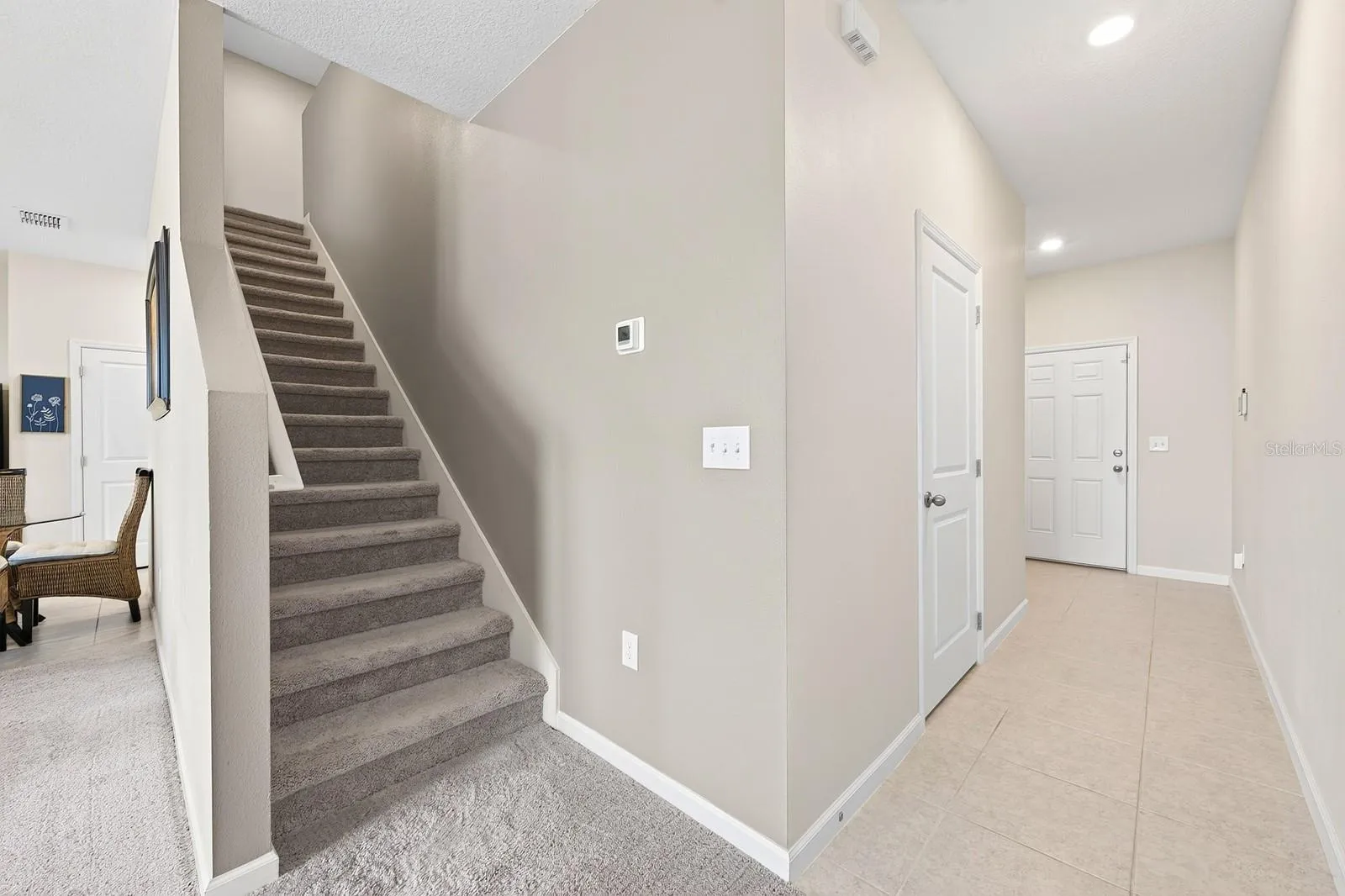Upstairs, all three bedrooms provide a comfortable retreat with PLUSH CARPETING and generous closet space.
