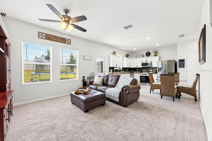 Inside, the thoughtfully designed OPEN-CONCEPT FLOOR PLAN seamlessly connects the Living Room and Kitchen, making it ideal for both everyday living and entertaining.