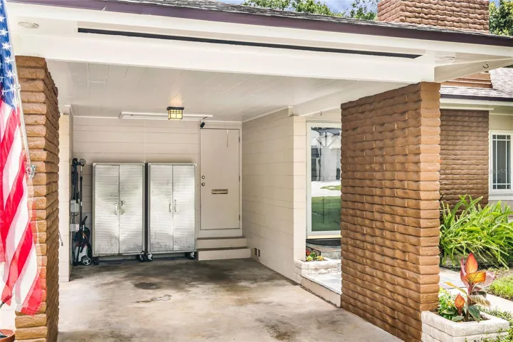 Carport with covered entry to house