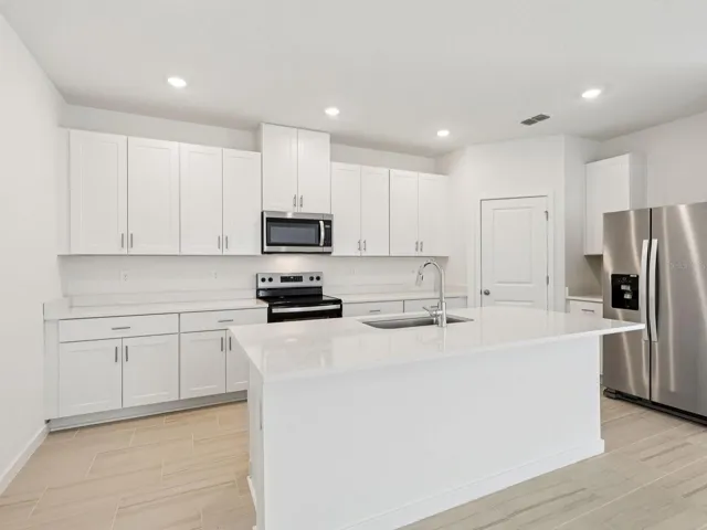 Photos are not of the actual home, but are photos of the builder home with same floorplan