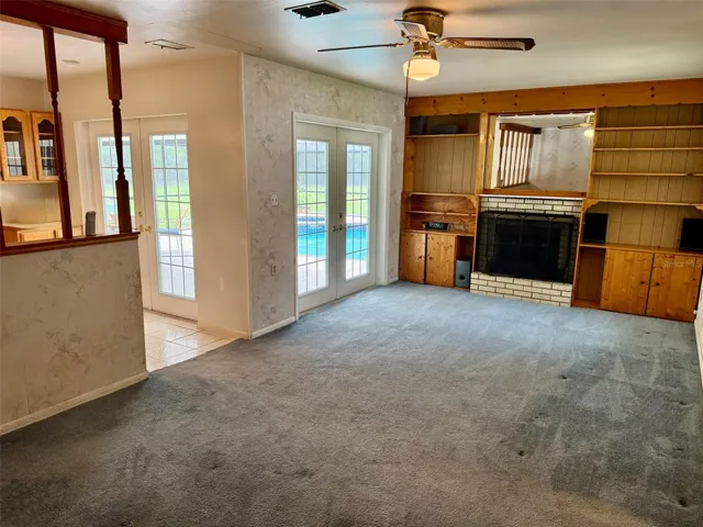 Family Room (w fireplace) - exit to pool area