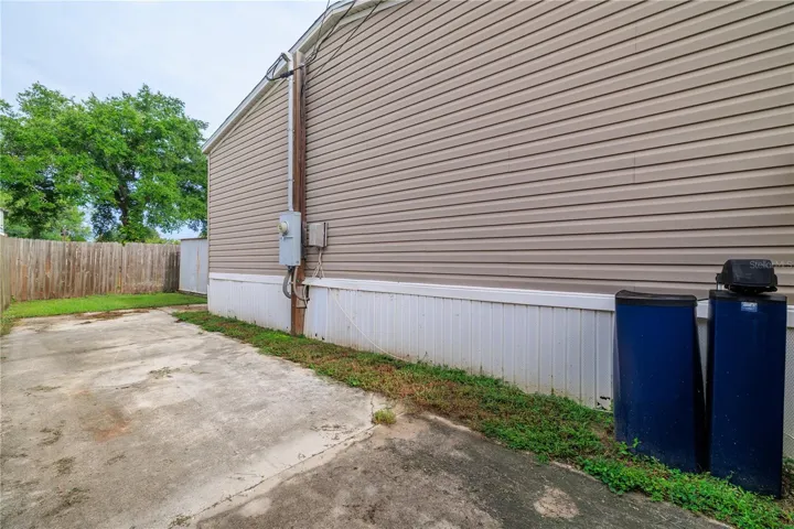 Spacious side-yard parking pad for boat or camper storage.