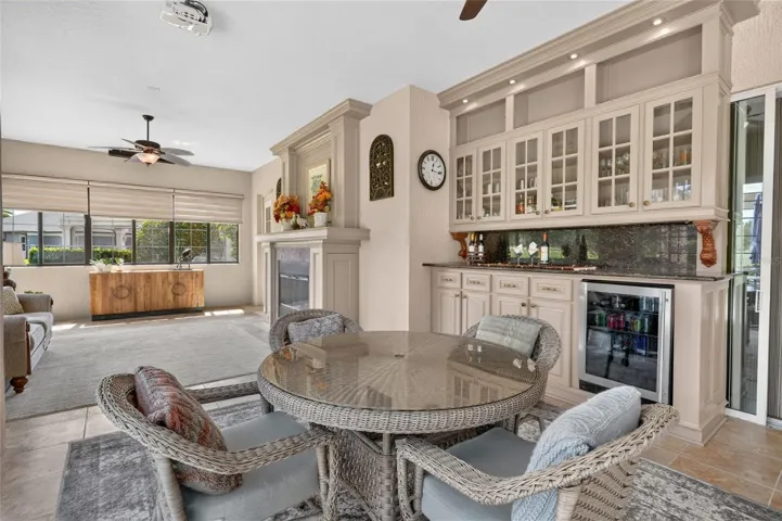 Bar area and fireplace enhance the space