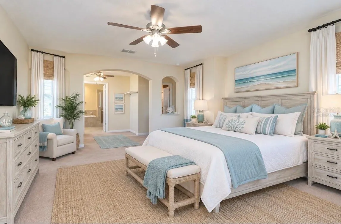 Virtually staged Primary Bedroom w/ Sitting Area