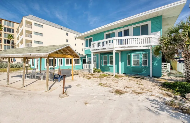 1st floor condo with toes in the sand right out your front door facing the beach.