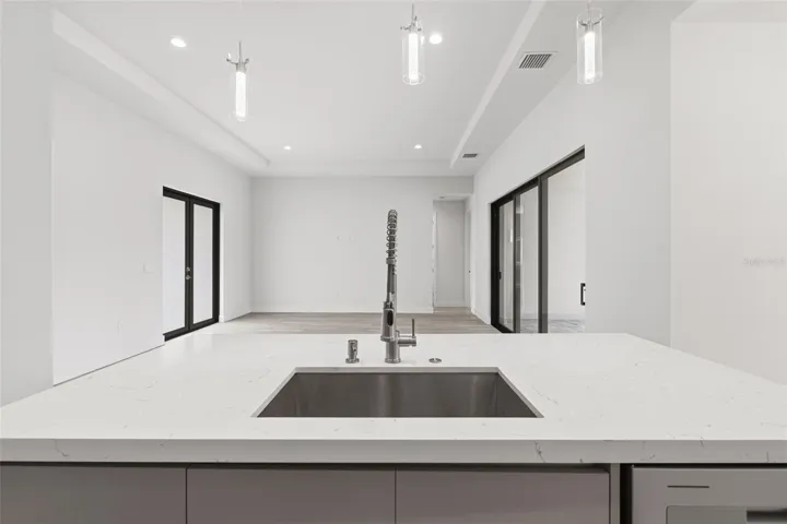 Kitchen Features Breakfast Bar and Stainless Appliances