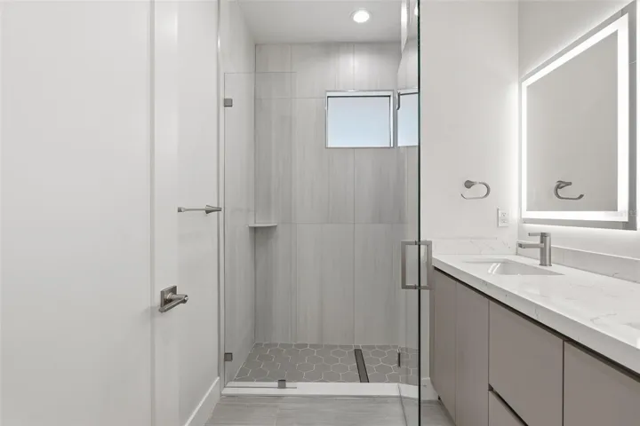 Primary Bathroom with Dual Vanity, LED Mirrors and Walk-In Glass Shower