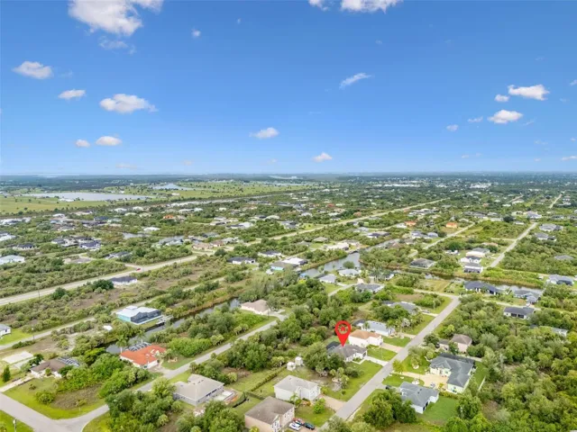 Overhead View of the Property and Surrounding Neighborhood