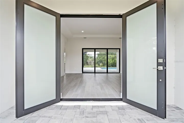 Double Frosted Entry Doors Welcome You Into the Home