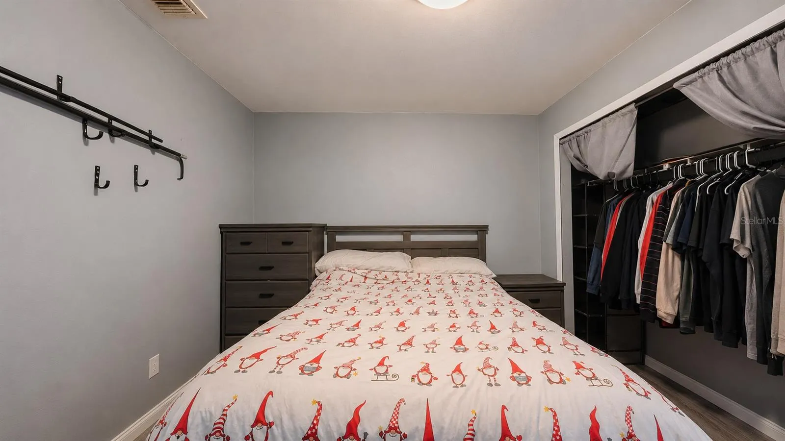 Secondary bedroom, view toward closet