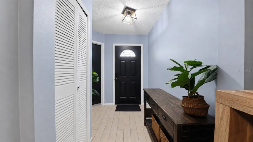 Foyer view toward front door