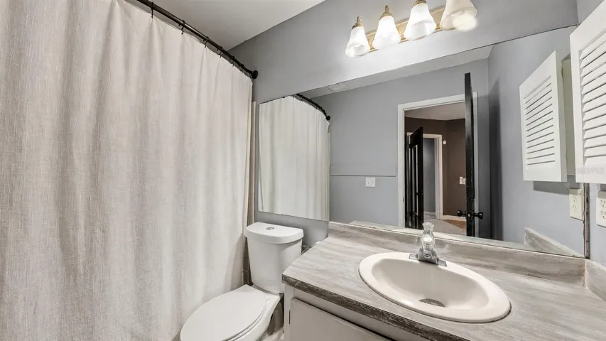 Full bathroom with tub/shower combo