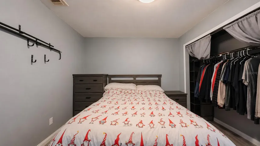 Secondary bedroom, view toward closet