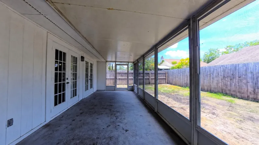 Rear exterior view of the screened porch structure