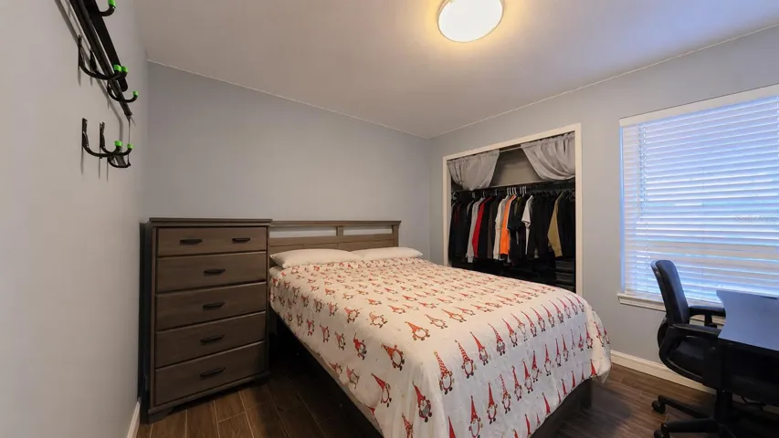 Secondary bedroom with closet