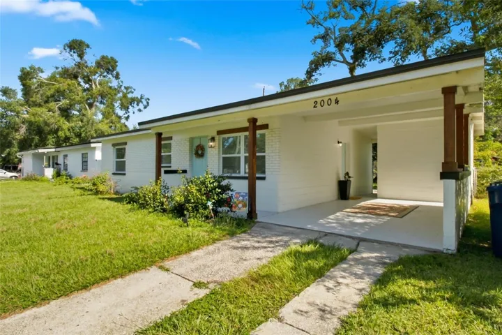 Welcome home to this charming 3 bedroom 2 bathroom ranch style home in a quiet corner of NE Seminole Heights!