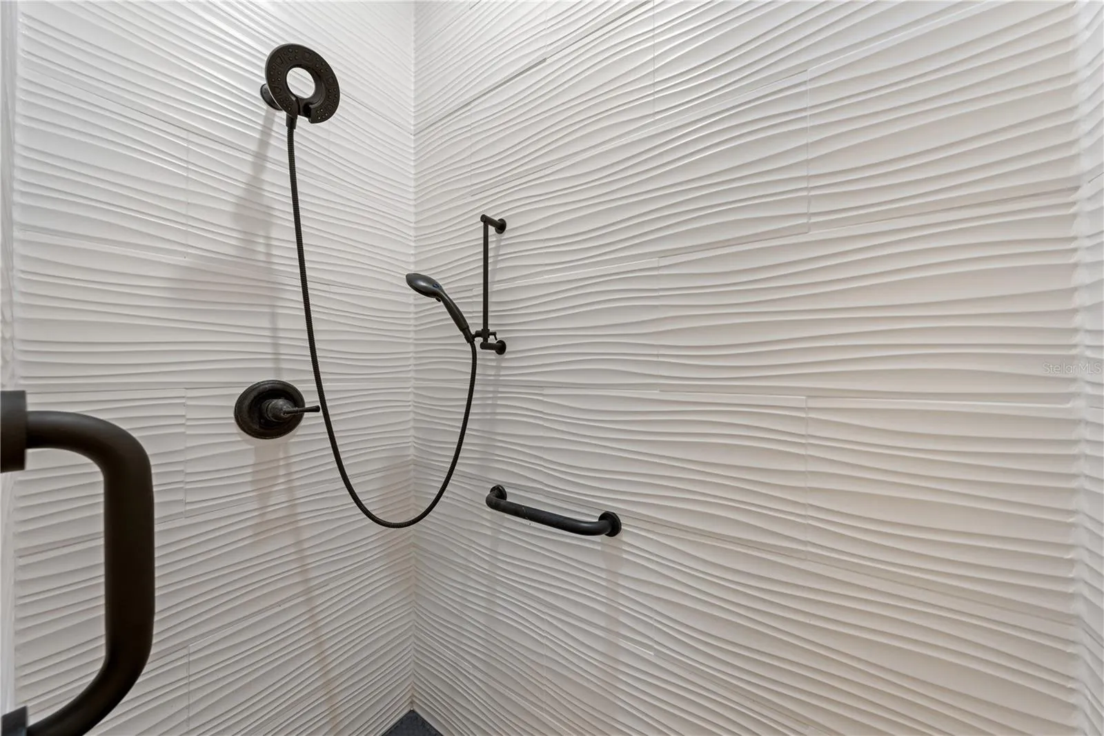 Primary bathroom with lots of updates and custom tile.