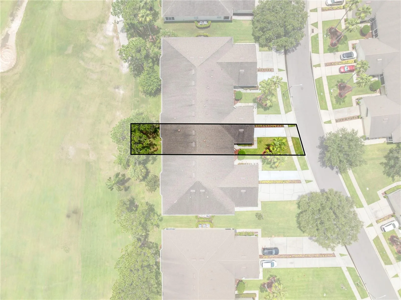 Unshaded area is 153 Club Villas with a view of the golf course from the rear lanai.