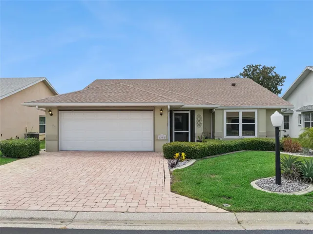 Located in the highly desirable gated community of Lake Henry Estates