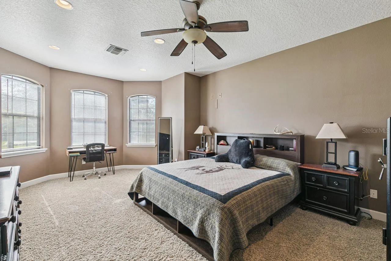Primary Bedroom on First Floor with Two Walk-In Closets