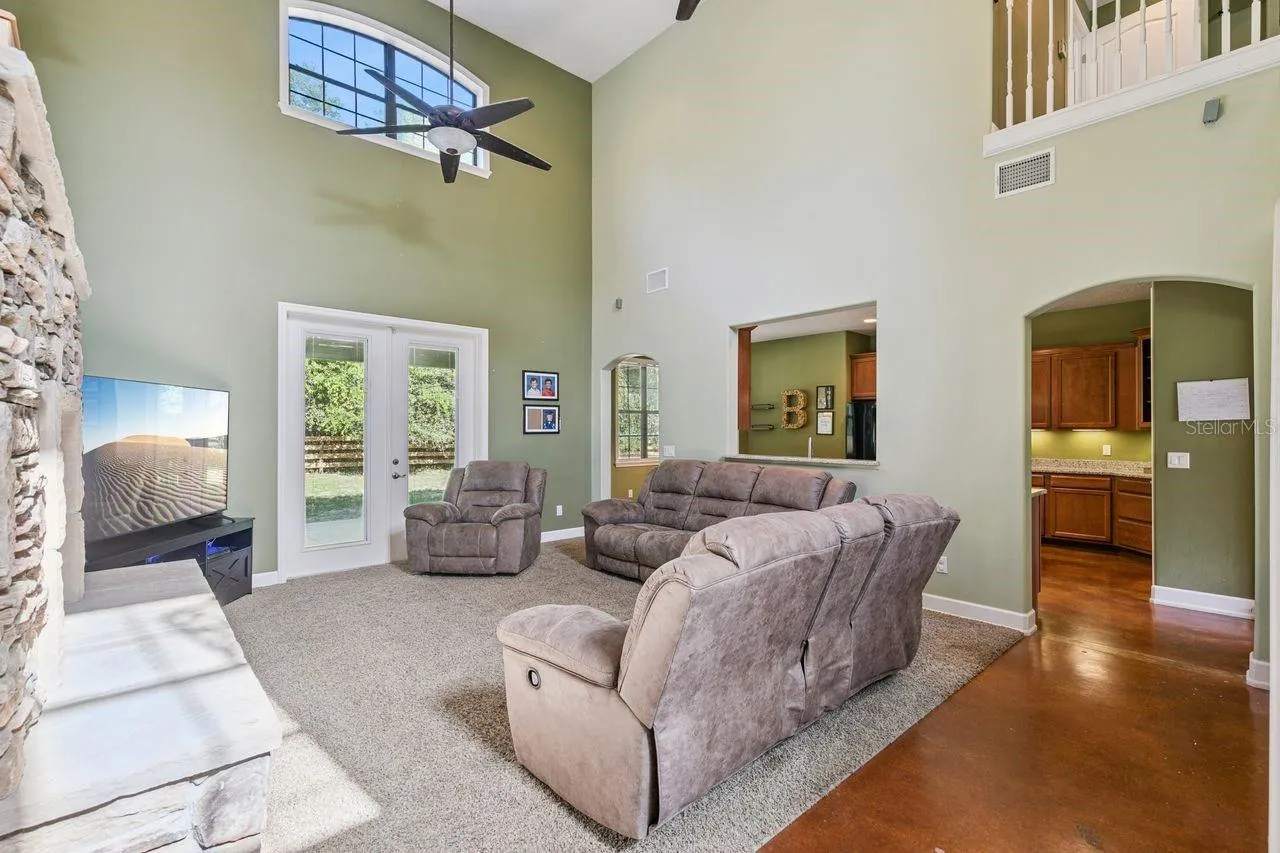 Living Room with French Doors that lead out to the Covered Patio