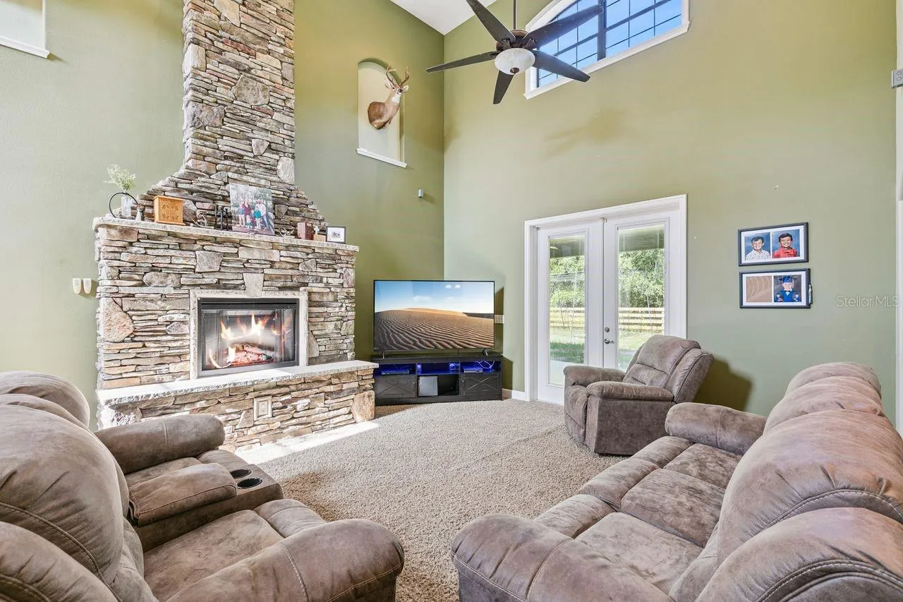 Living Room with French Doors that lead out to the Covered Patio