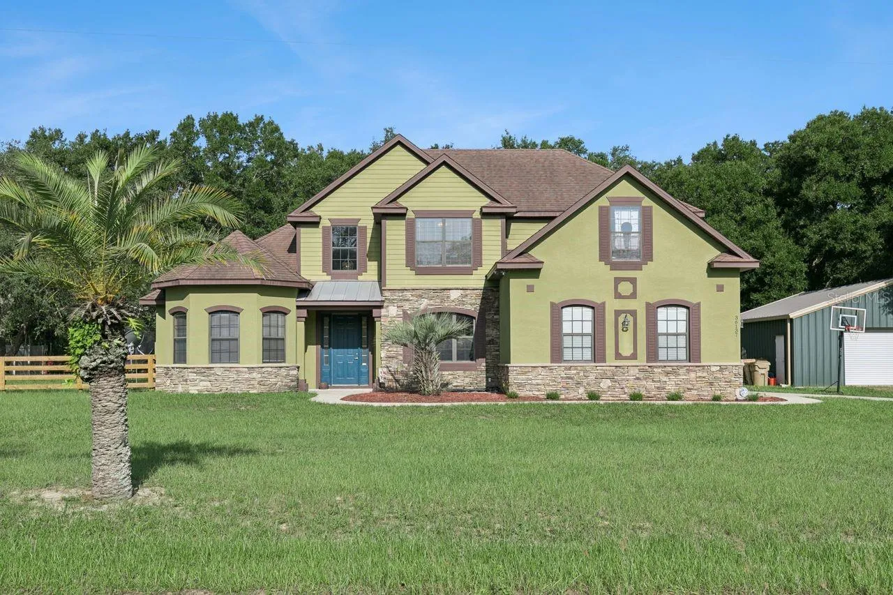 Spacious 5 Bedroom, 3 Bathroom, 2 Car Garage and Detached Garage Home on 1.68 Acre Lot