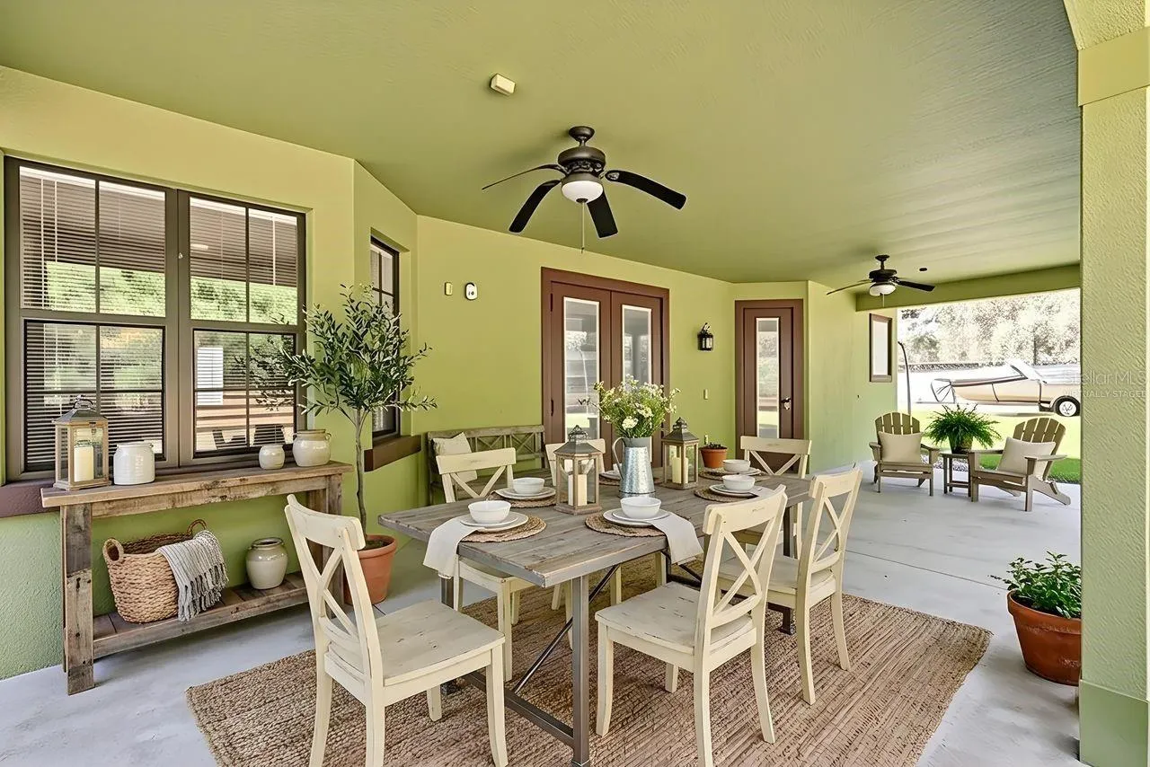 Virtually Staged Covered Patio with view to the Conservtion Area