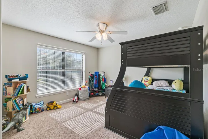 Fifth Bedroom on Second Floor with Walk-In Closet