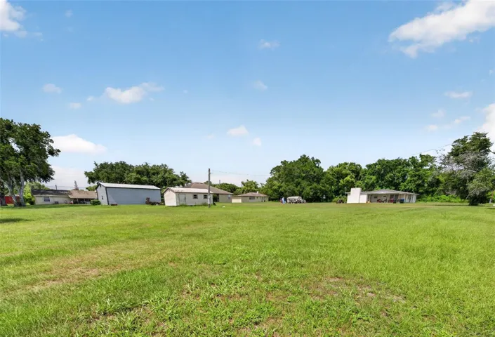 Wide yard view — room for additional lots if home is retained.