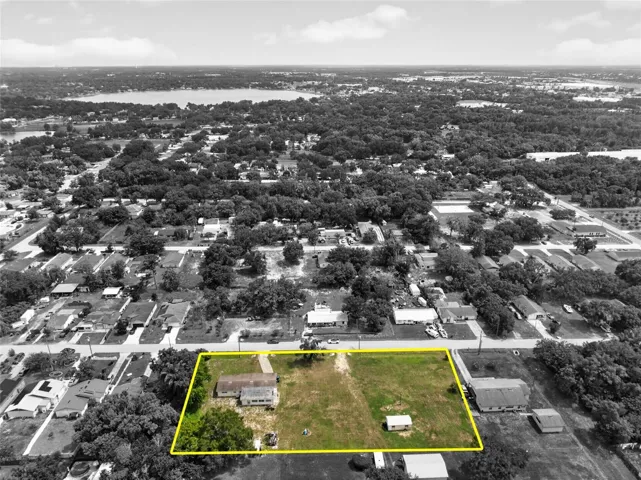Aerial spotlight highlighting the property within the block.