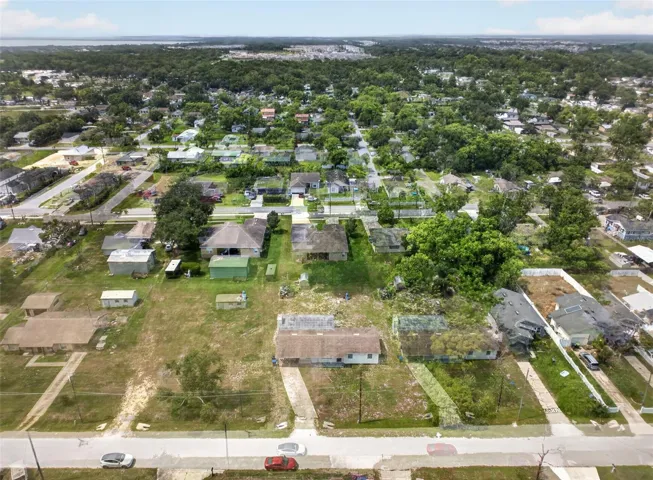 Aerial view of the property within the surrounding Ocoee neighborhood.