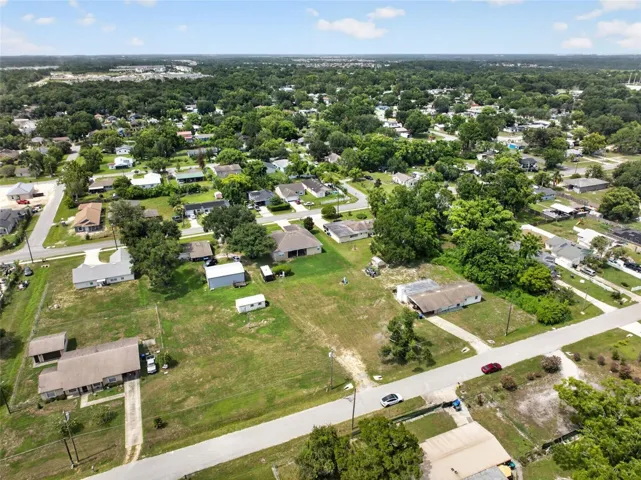 Aerial view of the property within the surrounding Ocoee neighborhood.