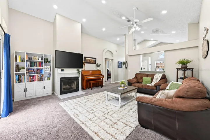 Living room is complete with a fireplace.
